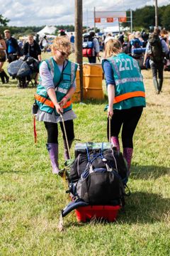 0016 Orange CATs carrying campers belongings 