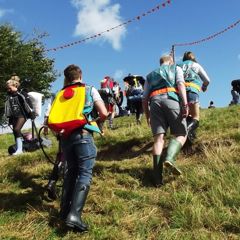 Hotbox Events festival stewards making their way up the famous Leeds Festival hill 