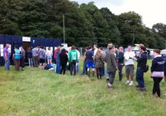 Festival volunteers booking in 