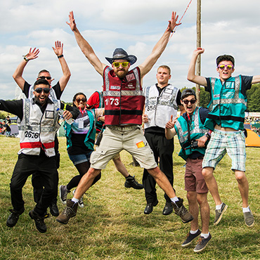 Volunteer at Leeds Festival - Campsite volunteers jumping