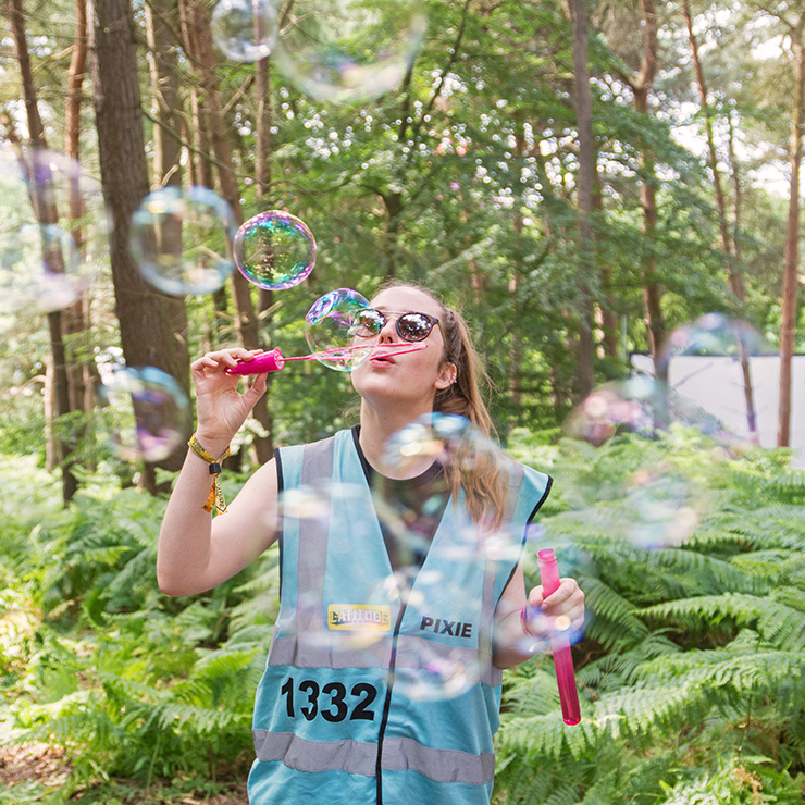 Volunteer at Latitude Festival with Hotbox Events - Pixie volunteer with bubbles