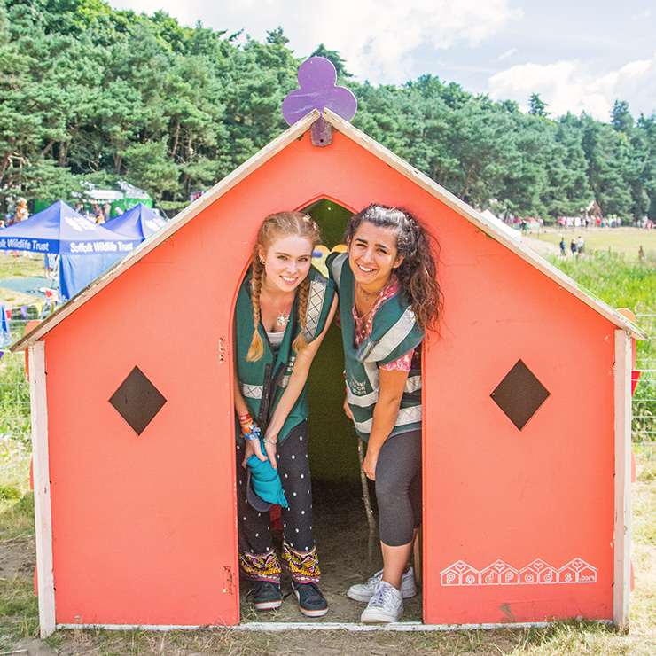 Volunteer at Camp Bestival with Hotbox Events - Right column - Kids area volunteers in little house