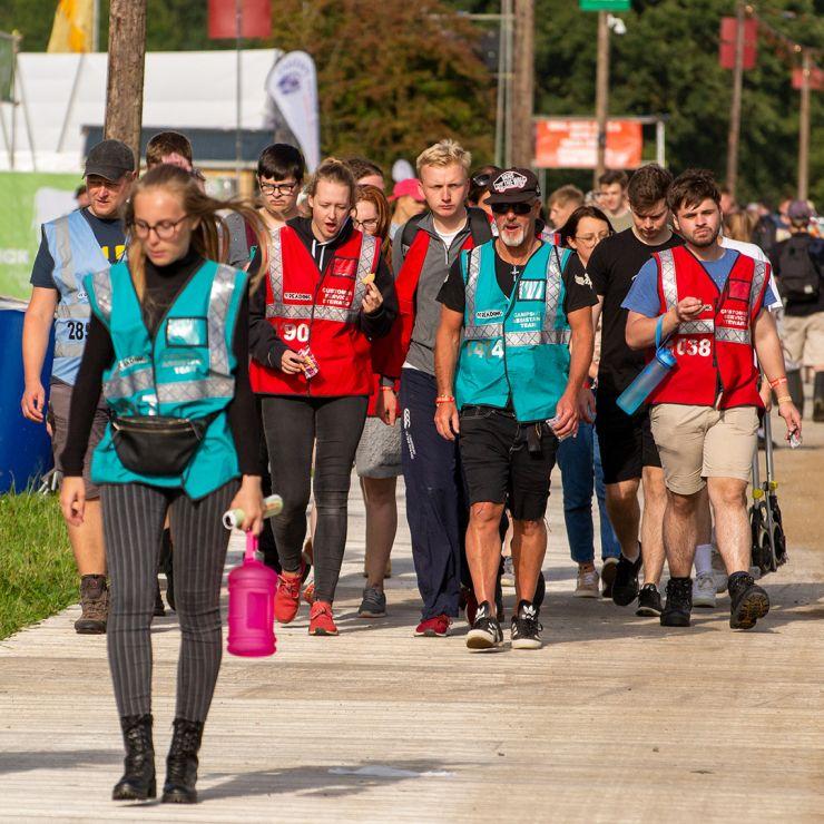 Festival and Event Staff - Hotbox Events - Staff team walking through campsite - 2022-001 740PxSq72Dpi