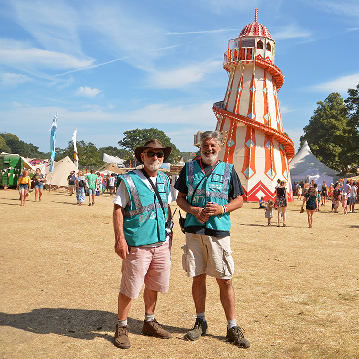 Jobs and Volunteering at Camp Bestival Dorset 2022 with Hotbox Events - Volunteers standing by helta skelta - 2022-001 740PxSq72Dpi