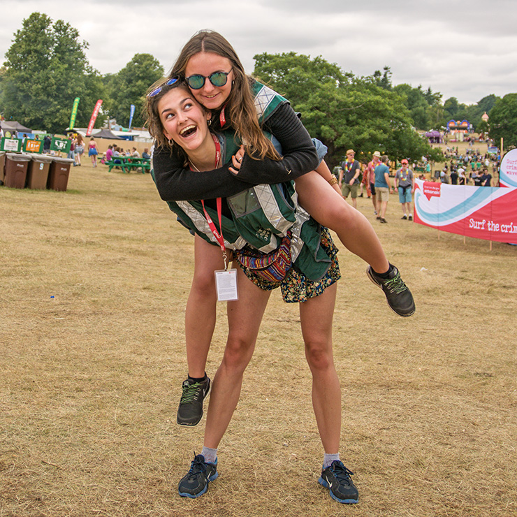 Jobs and Volunteering at Camp Bestival Dorset 2022 with Hotbox Events - Volunteer piggyback in the arena - 2022-001 740PxSq72Dpi