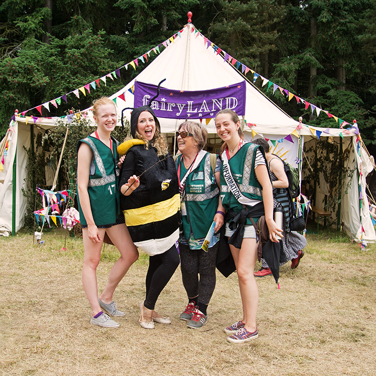 Jobs and Volunteering at Camp Bestival Dorset 2022 with Hotbox Events - Volunteers with a bee in the kids area - 2022-001 740PxSq72Dpi