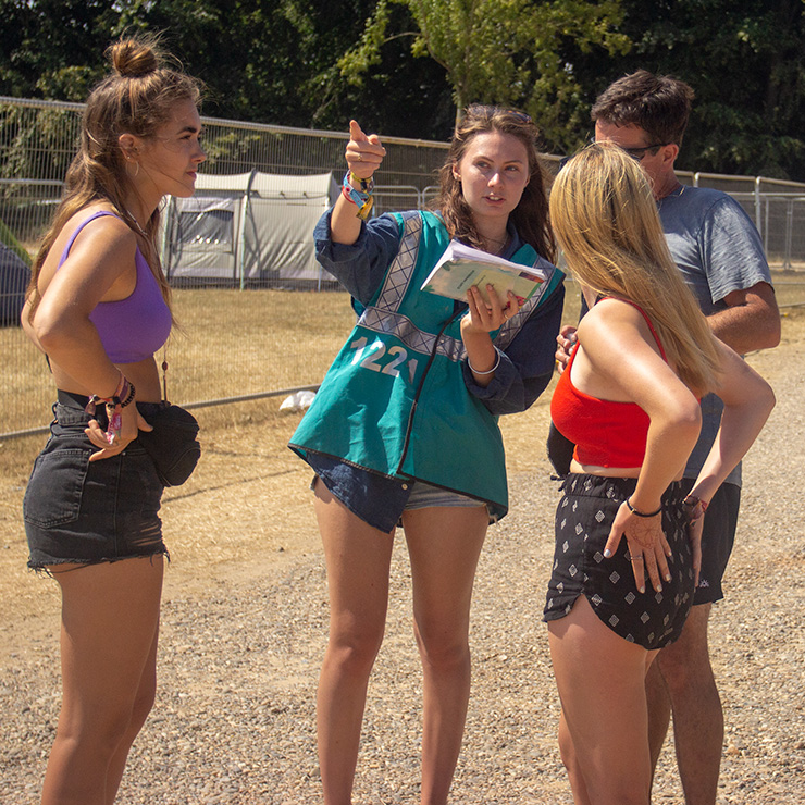 Jobs and Volunteering at Camp Bestival Shropshire 2022 with Hotbox Events - Campsite volunteer helping festival goers - 2022-001 740PxSq72Dpi