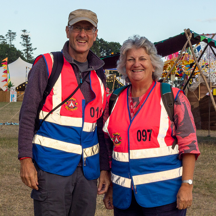 Jobs and Volunteering at Camp Bestival Shropshire with Hotbox Events - Arena volunteers smiling v2023001 740PxSq72Dpi