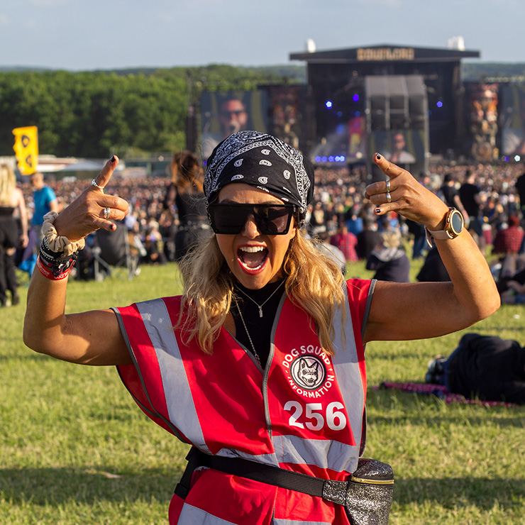 Volunteer at Download Festival with Hotbox Events - Arena volunteer with main stage in background v2023001 740PxSq72Dpi