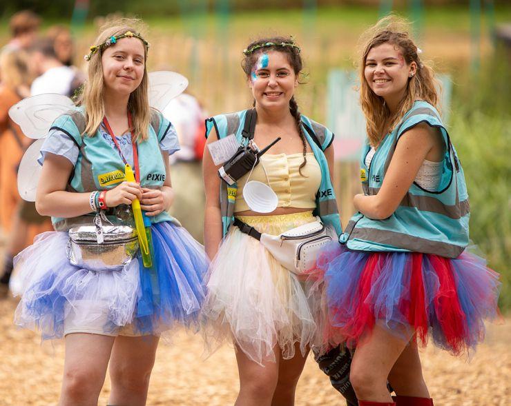 Volunteer at Latitude Festival 2022 with Hotbox Events - Pixie volunteers wearing wings by the lake - 2022-001 740PxSq72Dpi