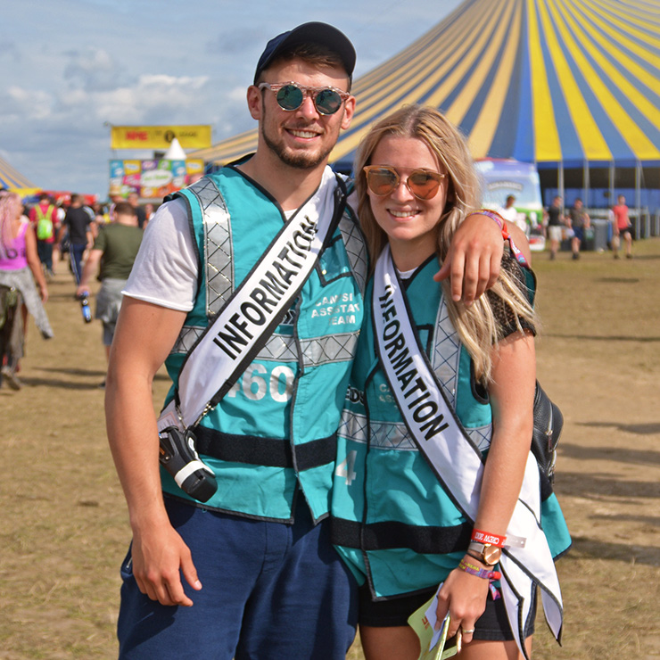 Volunteer at Leeds Festival with Hotbox Events - Volunteers hugging in main arena v2022001 740PxSq72Dpi